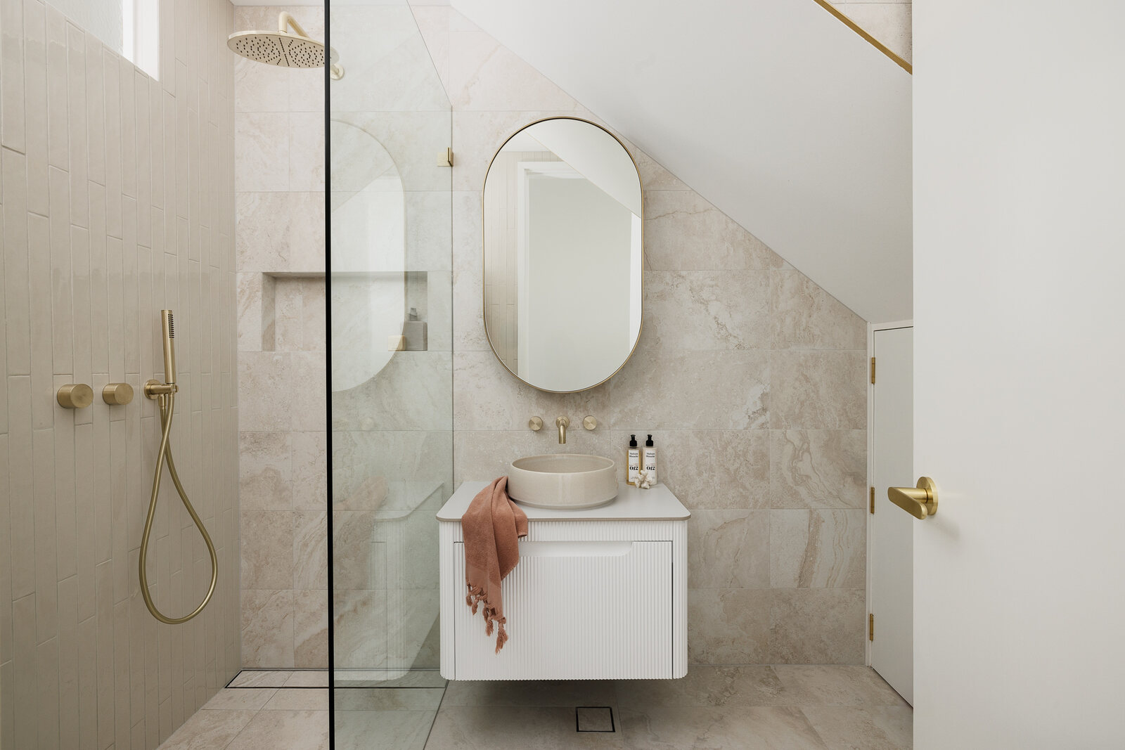 Fluted vanity & brass tapware